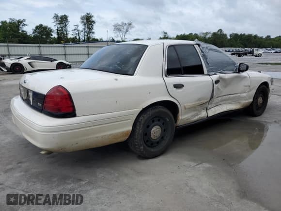 ✅ 2011 Ford Police Interceptor • VIN: 2FABP7BV7BX162787 • Lot: 59186925. Listed on Copart with 165,969 mi. Free auction sales archive from the USA and detailed vehicle history report at DreamBid. Image 3.