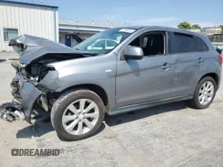 2015 Mitsubishi Outlander ES with VIN 4A4AP3AU2FE022752, listed as a Copart auction lot 71730925 with 212,695 mi miles and Salvage title. Bid and sale history available at DreamBid. Image 1.