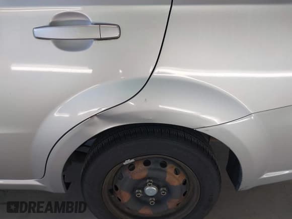 ✅ 2007 Chevrolet Aveo LS • VIN: KL1TD56667B049669 • Lot: 41989575. Wystawiony na IAAI z przebiegiem 73 710 mil. Bezpłatny archiwum sprzedaży aukcyjnych z USA i szczegółowy raport historii pojazdu na DreamBid. Zdjęcie 6.