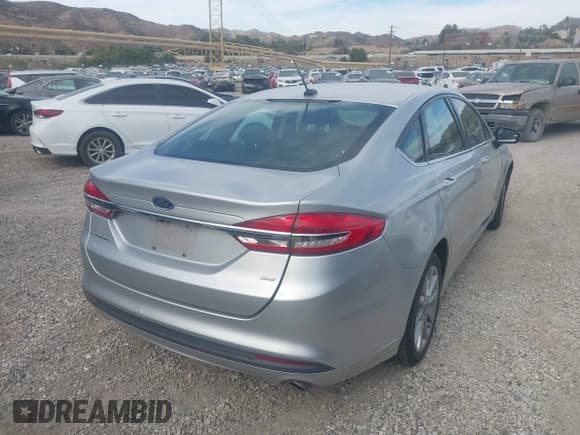 ✅ 2017 Ford Fusion SE • VIN: 3FA6P0H76HR242476 • Lot: 43565631. Listed on IAAI with 75,447 mi. Free auction sales archive from the USA and detailed vehicle history report at DreamBid. Image 4.
