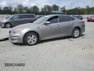 ✅ 2016 Kia Optima LX • VIN: 5XXGT4L38GG079218 • Lot: 85304075. Listed on Copart with 103,486 mi. Free auction sales archive from the USA and detailed vehicle history report at DreamBid. Image 1.