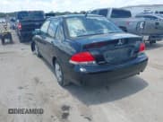 ✅ 2004 Mitsubishi Lancer ES • VIN: JA3AJ26E04U023128 • Lot: 42804725. Listed on IAAI with 167,183 mi. Free auction sales archive from the USA and detailed vehicle history report at DreamBid. Image 3.