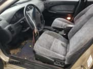 ✅ 1998 Nissan Maxima GXE • VIN: JN1CA21D7WM900325 • Lot: 62281515. Wystawiony na Copart z przebiegiem 139 901 mil. Bezpłatny archiwum sprzedaży aukcyjnych z USA i szczegółowy raport historii pojazdu na DreamBid. Zdjęcie 7.