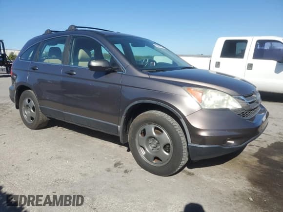 ✅ 2011 Honda CR-V LX • VIN: 3CZRE3H35BG701831 • Lot: 92059895. Wystawiony na Copart z przebiegiem 245 649 mil. Bezpłatny archiwum sprzedaży aukcyjnych z USA i szczegółowy raport historii pojazdu na DreamBid. Zdjęcie 4.