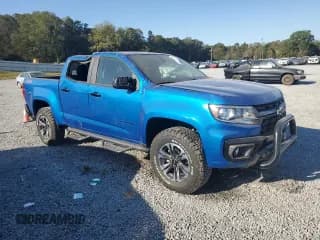 ✅ 2022 Chevrolet Colorado 4WD Z71 • VIN: 1GCGTDENXN1147977 • Лот: 75995264. Опубликован ранее на Copart с пробегом 26 184 миль. Бесплатный доступ к архиву аукционных продаж из США и подробный отчёт об истории автомобиля на DreamBid. Изображение 4.