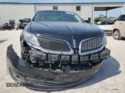 ✅ 2013 Lincoln MKS • VIN: 1LNHL9EK9DG614126 • Lot: 68549435. Wystawiony na Copart z przebiegiem 189 808 mil. Bezpłatny archiwum sprzedaży aukcyjnych z USA i szczegółowy raport historii pojazdu na DreamBid. Zdjęcie 5.