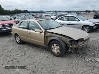 ✅ 2001 Saturn LS • VIN: 1G8JW52R51Y523667 • Лот: 72062224. Опубликован ранее на Copart с пробегом 123 345 миль. Бесплатный доступ к архиву аукционных продаж из США и подробный отчёт об истории автомобиля на DreamBid. Изображение 4.