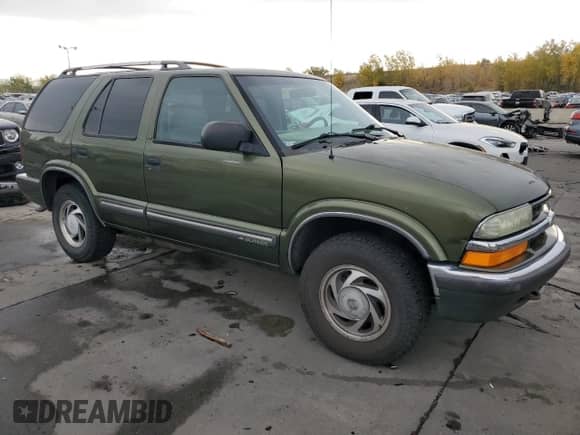 2001 Chevrolet Blazer LT z VIN 1GNDT13W21K240291, wystawiony jako Copart lot #76192674 z przebiegiem 227 111 mil mil oraz Szkoda całkowita • Salvage title. Historia ofert i sprzedaży dostępna na DreamBid. Obrazek 4.
