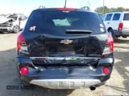 ✅ 2013 Chevrolet Captiva Sport LT • VIN: 3GNAL3EK1DS597754 • Lot: 41316028. Wystawiony na IAAI z przebiegiem 200 519 mil. Bezpłatny archiwum sprzedaży aukcyjnych z USA i szczegółowy raport historii pojazdu na DreamBid. Zdjęcie 6.