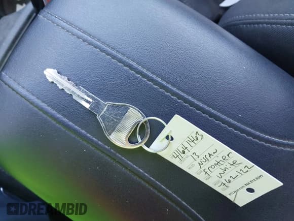 ✅ 2013 Nissan Frontier S • VIN: 1N6BD0CT7DN762122 • Lot: 41641463. Listed on IAAI with 175,402 mi. Free auction sales archive from the USA and detailed vehicle history report at DreamBid. Image 11.