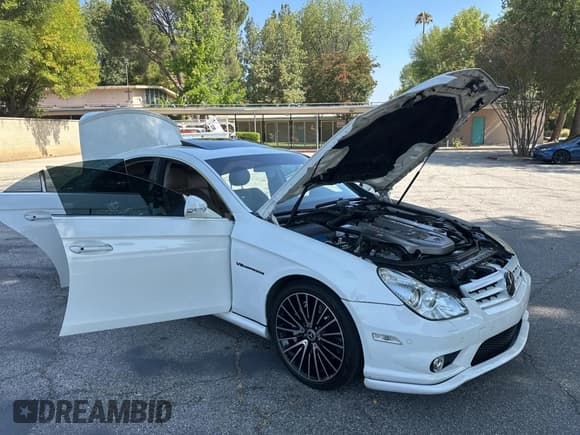 ✅ 2006 Mercedes-Benz CLS 55 AMG • VIN: WDDDJ76X66A014683 • Lot: 65393595. Wystawiony na Copart z przebiegiem 99 430 mil. Bezpłatny archiwum sprzedaży aukcyjnych z USA i szczegółowy raport historii pojazdu na DreamBid. Zdjęcie 12.