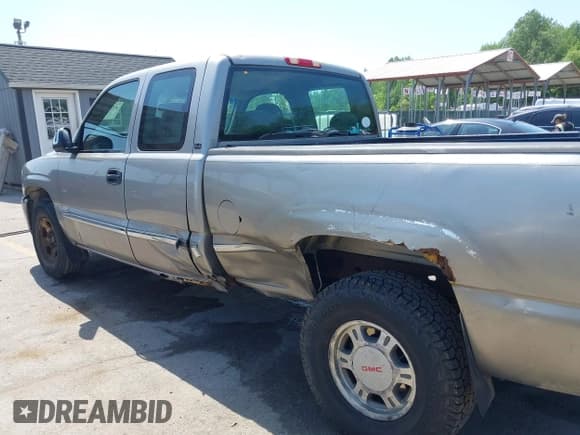 ✅ 2001 GMC Sierra 1500 SLE • VIN: 1GTEK19T31E271805 • Лот: 42167399. Опубликован ранее на IAAI с пробегом 206 202 миль. Бесплатный доступ к архиву аукционных продаж из США и подробный отчёт об истории автомобиля на DreamBid. Изображение 6.