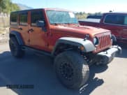 ✅ 2014 Jeep Wrangler Unlimited Rubicon • VIN: 1C4HJWFG3EL210802 • Lot: 43295800. Listed on IAAI with 117,719 mi. Free auction sales archive from the USA and detailed vehicle history report at DreamBid. Image 1.