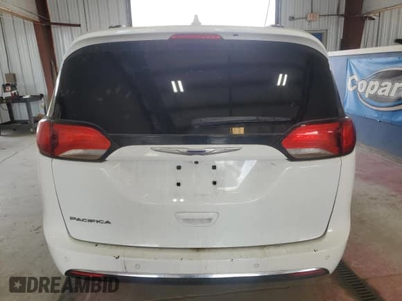 ✅ 2019 Chrysler Pacifica Touring L • VIN: 2C4RC1BG2KR626074 • Lot: 68841935. Wystawiony na Copart z przebiegiem Nie podano. Bezpłatny archiwum sprzedaży aukcyjnych z USA i szczegółowy raport historii pojazdu na DreamBid. Zdjęcie 6.