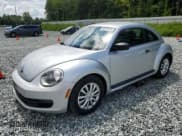 ✅ 2012 Volkswagen Beetle Entry • VIN: 3VWFP7AT0CM615654 • Lot: 69775265. Listed on Copart with 87,013 mi. Free auction sales archive from the USA and detailed vehicle history report at DreamBid. Image 1.