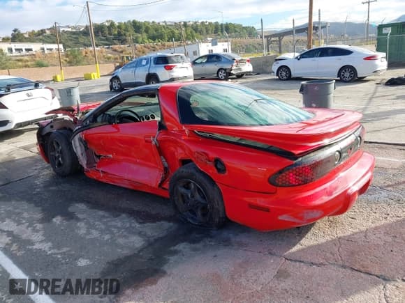 ✅ 2002 Pontiac Firebird Firebird • VIN: 2G2FS22K622117134 • Lot: 43747355. Listed on IAAI with 131,518 mi. Free auction sales archive from the USA and detailed vehicle history report at DreamBid. Image 3.