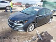 ✅ 2017 Chevrolet Cruze LT • VIN: 3G1BE6SM4HS516419 • Lot: 43594135. Listed on IAAI with 54,908 mi. Free auction sales archive from the USA and detailed vehicle history report at DreamBid. Image 2.