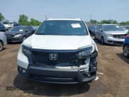 ✅ 2021 Honda Passport EX-L • VIN: 5FNYF8H59MB007097 • Lot: 42409181. Listed on IAAI with 74,410 mi. Free auction sales archive from the USA and detailed vehicle history report at DreamBid. Image 12.