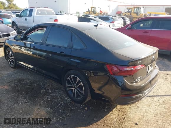 ✅ 2023 Volkswagen Jetta Sport • VIN: 3VWAM7BU5PM052116 • Lot: 43210653. Listed on IAAI with 27,675 mi. Free auction sales archive from the USA and detailed vehicle history report at DreamBid. Image 3.