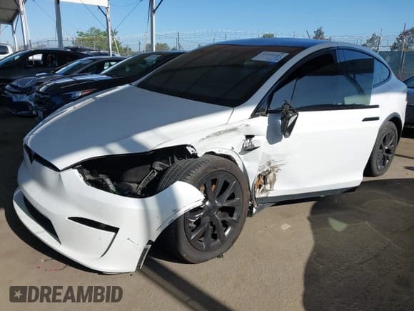 ✅ 2022 Tesla Model X • VIN: 7SAXCBE57NF337329 • Lot: 42294247. Wystawiony na IAAI z przebiegiem 52 994 mil. Bezpłatny archiwum sprzedaży aukcyjnych z USA i szczegółowy raport historii pojazdu na DreamBid. Zdjęcie 2.