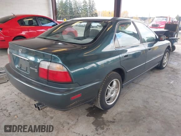 ✅ 1996 Honda Accord EX • VIN: 1HGCD5651TA074674 • Lot: 43734241. Listed on IAAI with 421,316 mi. Free auction sales archive from the USA and detailed vehicle history report at DreamBid. Image 4.