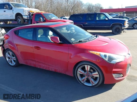 ✅ 2013 Hyundai Veloster w/Black Int • VIN: KMHTC6AD3DU146038 • Lot: 41433673. Wystawiony na IAAI z przebiegiem 173 283 mil. Bezpłatny archiwum sprzedaży aukcyjnych z USA i szczegółowy raport historii pojazdu na DreamBid. Zdjęcie 1.