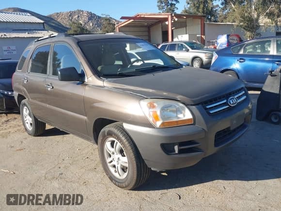 ✅ 2008 Kia Sportage LX • VIN: KNDJF723687491258 • Лот: 43857058. Опубликован ранее на IAAI с пробегом 176 341 миль. Бесплатный доступ к архиву аукционных продаж из США и подробный отчёт об истории автомобиля на DreamBid. Изображение 1.