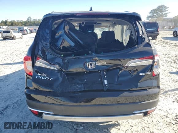 ✅ 2019 Honda Pilot Touring 8-Passenger • VIN: 5FNYF5H99KB013691 • Lot: 76752734. Listed on Copart with Not provided. Free auction sales archive from the USA and detailed vehicle history report at DreamBid. Image 6.