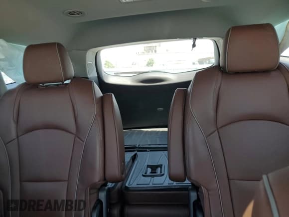 ✅ 2021 Buick Enclave Avenir • VIN: 5GAEVCKW9MJ260862 • Lot: 68333125. Wystawiony na Copart z przebiegiem 67 172 mil. Bezpłatny archiwum sprzedaży aukcyjnych z USA i szczegółowy raport historii pojazdu na DreamBid. Zdjęcie 10.