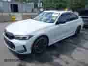2023 BMW 3 Series M340i with VIN 3MW49FS00P8D11321, listed as a IAAI auction lot 42794821 with 46,037 mi miles and . Bid and sale history available at DreamBid. Image 2.