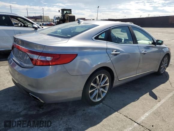 ✅ 2015 Hyundai Azera • VIN: KMHFG4JG6FA463476 • Lot: 85899515. Listed on Copart with 140,245 mi. Free auction sales archive from the USA and detailed vehicle history report at DreamBid. Image 3.