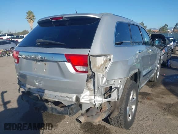 ✅ 2012 Jeep Grand Cherokee Limited • VIN: 1C4RJEBG2CC201946 • Lot: 43619083. Listed on IAAI with 168,571 mi. Free auction sales archive from the USA and detailed vehicle history report at DreamBid. Image 4.