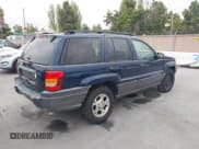 ✅ 2003 Jeep Grand Cherokee Laredo • VIN: 1J4GX48S13C504710 • Лот: 43410111. Опубликован ранее на IAAI с пробегом 352 519 миль. Бесплатный доступ к архиву аукционных продаж из США и подробный отчёт об истории автомобиля на DreamBid. Изображение 4.