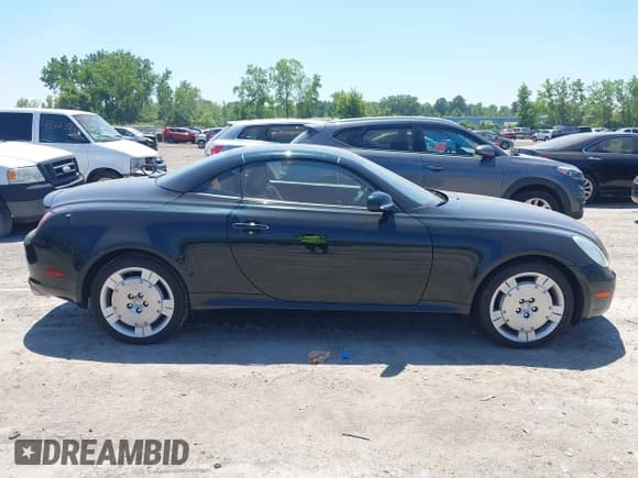 ✅ 2004 Lexus SC 430 • VIN: JTHFN48Y340049520 • Lot: 42643447. Wystawiony na IAAI z przebiegiem 84 488 mil. Bezpłatny archiwum sprzedaży aukcyjnych z USA i szczegółowy raport historii pojazdu na DreamBid. Zdjęcie 13.