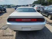 ✅ 2014 Dodge Challenger SXT • VIN: 2C3CDYAG0EH149589 • Lot: 80923345. Wystawiony na Copart z przebiegiem 97 282 mil. Bezpłatny archiwum sprzedaży aukcyjnych z USA i szczegółowy raport historii pojazdu na DreamBid. Zdjęcie 6.