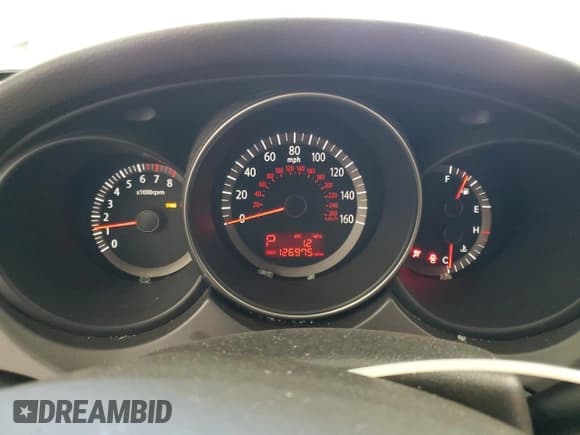 ✅ 2009 Kia Optima EX • VIN: KNAGE228295323493 • Lot: 83819085. Listed on Copart with 126,975 mi. Free auction sales archive from the USA and detailed vehicle history report at DreamBid. Image 9.