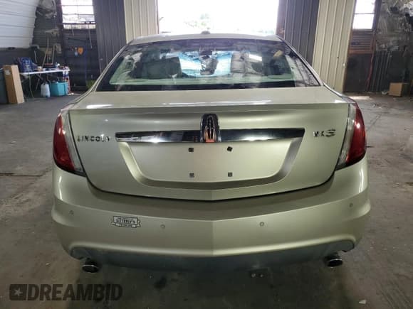 ✅ 2010 Lincoln MKS • VIN: 1LNHL9DR3AG614827 • Lot: 62891885. Wystawiony na Copart z przebiegiem Nie podano. Bezpłatny archiwum sprzedaży aukcyjnych z USA i szczegółowy raport historii pojazdu na DreamBid. Zdjęcie 6.