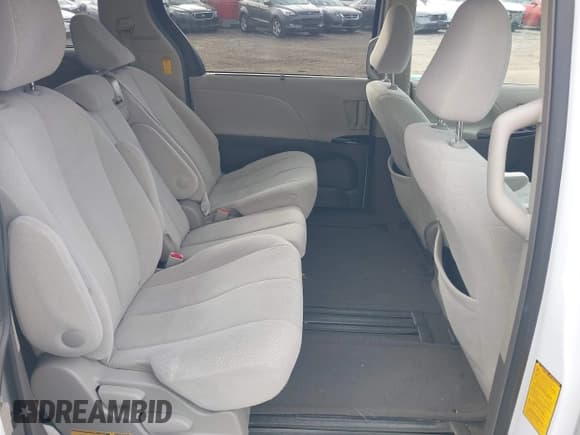 ✅ 2014 Toyota Sienna LE • VIN: 5TDKK3DC6ES478033 • Lot: 43649935. Listed on IAAI with 219,697 mi. Free auction sales archive from the USA and detailed vehicle history report at DreamBid. Image 8.