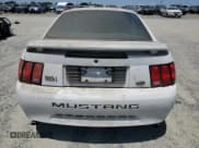 ✅ 2004 Ford Mustang Standard • VIN: 1FAFP40624F164974 • Lot: 57714955. Listed on Copart with Not provided. Free auction sales archive from the USA and detailed vehicle history report at DreamBid. Image 6.