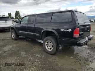 2003 Dodge Dakota Sport z VIN 1D7HG32N43S102313, wystawiony jako Copart lot #70307144 z przebiegiem 139 079 mil mil oraz Szkoda całkowita • Salvage title. Historia ofert i sprzedaży dostępna na DreamBid. Obrazek 2.