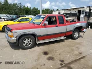 1995 Dodge Dakota z VIN 1B7GL23YXSS155861, wystawiony jako Copart lot #64209414 z przebiegiem 336 037 mil mil oraz Szkoda całkowita • Salvage title. Historia ofert i sprzedaży dostępna na DreamBid. Obrazek 1.