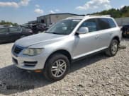 ✅ 2008 Volkswagen Touareg V6 • VIN: WVGBE77L18D064809 • Lot: 71832225. Listed on Copart with 126,866 mi. Free auction sales archive from the USA and detailed vehicle history report at DreamBid. Image 1.