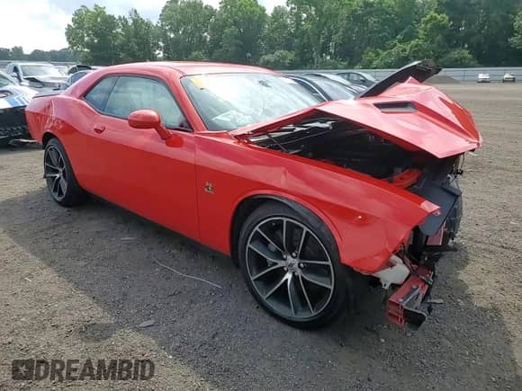 2018 Dodge Challenger T/A 392 with VIN 2C3CDZFJ8JH327379, listed as a Copart auction lot 65124915 with 98,259 mi miles and Salvage title. Bid and sale history available at DreamBid. Image 13.