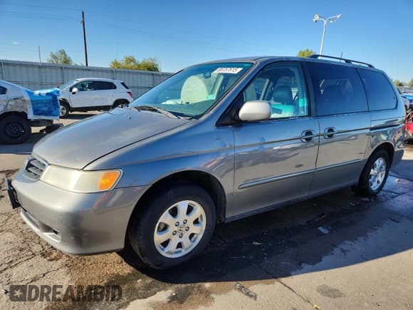 ✅ 2002 Honda Odyssey EX-L • VIN: 2HKRL18912H540373 • Лот: 85757615. Опубликован ранее на Copart с пробегом 227 720 миль. Бесплатный доступ к архиву аукционных продаж из США и подробный отчёт об истории автомобиля на DreamBid. Изображение 1.