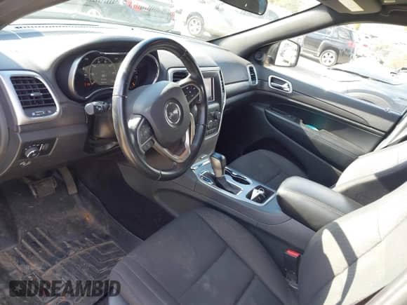 2018 Jeep Grand Cherokee Altitude z VIN 1C4RJFAG3JC503217, wystawiony jako IAAI lot #43588525 z przebiegiem 75 607 mil mil oraz . Historia ofert i sprzedaży dostępna na DreamBid. Obrazek 17.