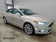 ✅ 2017 Ford Fusion Platinum • VIN: 3FA6P0D98HR100136 • Lot: 83815345. Listed on Copart with 99,002 mi. Free auction sales archive from the USA and detailed vehicle history report at DreamBid. Image 4.