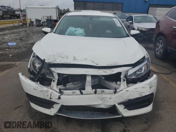 ✅ 2017 Honda Civic LX • VIN: 19XFC2F56HE032583 • Lot: 81616255. Wystawiony na Copart z przebiegiem 86 058 mil. Bezpłatny archiwum sprzedaży aukcyjnych z USA i szczegółowy raport historii pojazdu na DreamBid. Zdjęcie 5.