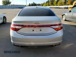 2015 Hyundai Azera z VIN KMHFG4JGXFA454022, wystawiony jako Copart lot #76517844 z przebiegiem 133 895 mil mil oraz Szkoda całkowita • Salvage title. Historia ofert i sprzedaży dostępna na DreamBid. Obrazek 6.