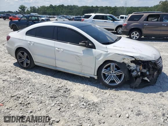 ✅ 2017 Volkswagen CC R-Line Executive • VIN: WVWFP7AN2HE500944 • Лот: 62609465. Опубликован ранее на Copart с пробегом 141 578 миль. Бесплатный доступ к архиву аукционных продаж из США и подробный отчёт об истории автомобиля на DreamBid. Изображение 4.