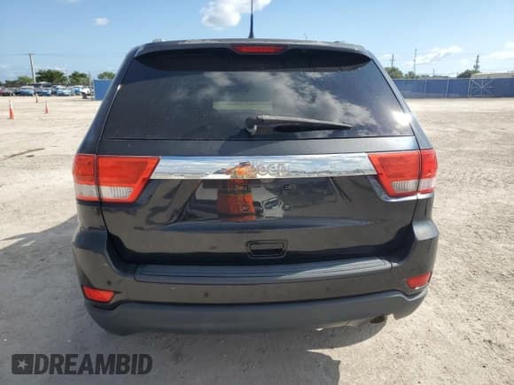 ✅ 2011 Jeep Grand Cherokee Laredo • VIN: 1J4RS4GG6BC517052 • Лот: 93685175. Опубликован ранее на Copart с пробегом 95 124 миль. Бесплатный доступ к архиву аукционных продаж из США и подробный отчёт об истории автомобиля на DreamBid. Изображение 6.